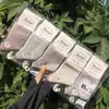 Meias esportivas de algodão para mulheres, trama de mil pés, comprimento até o meio da panturrilha, tricô à máquina integrado, meias de algodão, cor sistema Maillard café com leite de moca, 26 Outono/Inverno