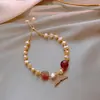 Pulsera de perla barroca chapada en oro real de 14K pulsera de cola de pez microincrustada diseño de moda ins pulsera para amigas estudiantes