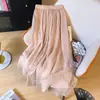 Falda corta de algodón y lino de color liso retro literario para mujer, nueva de verano, versátil para el trabajo, cintura elástica, falda de doble capa de hada con temperamento