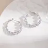 Brincos de argola grandes com diamante pontiagudo incrustado de cobre para mulheres, luxo leve, brincos em formato de C com zircônia irregular, estilo europeu e americano, de temperamento, brincos redondos, atacado