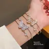 Pulseira Aberta Asa de Borboleta Dupla Camada com Zircônia Cúbica Estilo Coreano para Mulheres Elegante Versátil para o Dia a Dia Joia de Mão com Toque de Luxo Leve Venda por Atacado