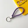 Llavero creativo llavero de cuerda de cuero cordón para llaves colgante de joyería cordón tejido fábrica de cuerda de cuero venta al por mayor