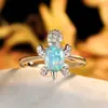Anillo de tortuga colorido de platino y diamante azul más vendido transfronterizo moda para hombres y mujeres anillo simple una generación de venta al por mayor