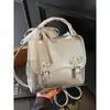 Mochila para Mujer Estilo Colegio Británico 2026 Primavera Nueva Moda Correa de Bufanda de Seda Mochila Vintage Mochila de Estilo Coreano de Moda