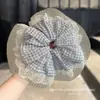 Selección PremiumElásticos elegantes y con estilo, nueva colección de accesorios para el cabello de nicho de alta gama para recoger el cabello en la parte posterior de la cabeza