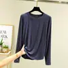 Camiseta de manga larga raglán de modal para mujer, nuevo estilo de principios de otoño, cuello redondo, corte holgado, talla grande, camiseta básica versátil, top fino para dormir