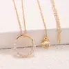Colar com Pingente de Anel de Möbius Feminino de Alto Padrão Corrente Clavicular 18K Pingente Cravejado com Zircônia Colar Atacado de Fábrica