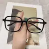 Gafas nuevas de montura grande anti-luz azul súper populares con remaches en Xiaohongshu, unisex, gafas populares de montura negra que hacen que las caras grandes parezcan más delgadas