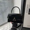 Bolsa quadrada pequena única, moderna, casual, texturizada, simples, nova coleção primavera 2026, elegante, de nicho, feminina, de ombro e transversal