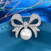 Broche de perlas con lazo estilo Chanel, nuevo estilo 2024, alfiler para cuello, accesorio de ropa que combina con todo, ramillete antideslumbrante.