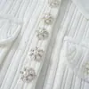 Vestido de punto blanco pequeño y fragante nuevo clásico para primavera y verano con efecto adelgazante en la cintura y elegante hilo de diamante de línea A