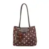 Bolso Retro de Gamuza y Felpa Otoño e Invierno para Mujer 2026 Nueva Moda Lunares Bolso de Hombro Único para el Trabajo Bolso Tote de Alta Gama