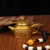 Novo Modelo de Estatueta Dourada Pintada do Deus da Riqueza de Cinco Vias com Cabo de Bule, Peça de Mahjong e um Ornamento de "Sucesso Instantâneo"