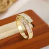 Anillo de diamante entrelazado de doble capa estilo ins europeo y americano con esmalte blanco y negro, anillo de circón de lujo ligero con un diseño único