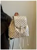 Mochila de lunares de estilo coreano, moderna y juvenil, de nicho, para mujer, casual y versátil para ir al trabajo, mochila ligera para estudiantes