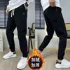 Otoño Invierno Nuevo Estilo Felpa Cálida Pantalones Casuales Hombre Estilo Coreano Cintura Elástica Cálida Holgados Harem Pierna Cónica Pantalones Alto Volumen
