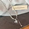 Collar de Mariposa Azul Perla Plata Rota Francesa Lujo Accesible Cadena de Clavícula de Gama Alta Nicho Collar con Borlas Versátil
