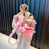 Chaveiro acrílico de despertador fofo com óleo, decoração para mochila de estudante, pingente de chaveiro criativo de garrafa com areia líquida atacado
