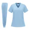 Suministro directo de fábrica de uniformes médicos tipo scrub, trajes scrub elásticos en cuatro direcciones, ropa de trabajo tipo jogger de manga corta para clínicas médicas y de belleza