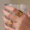 Rueda de la Fortuna Nuevo Anillo de Acero Inoxidable Diamante Trébol de Cuatro Hojas Estilo Ins Europeo y Americano Simple y Versátil Anillo que No se Desvanece para Mujeres