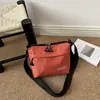 Otoño 2026 Nuevo Simple Cuadros Gran Capacidad Moderno Exterior Viaje Nylon Cuadros Versátil Hombro Cruzado Bolso