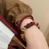 Nueva Serie de Pulseras de Cuentas Zhuasa de Tendencia Nacional con Cáscara de Coco Estilo de Lujo Ligero Nicho para Mujeres que Realza el Cutis