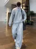 Tendencia Otoño 2025 Traje Casual de Botón Turquesa de Gama Alta para Hombre Conjunto de Dos Piezas Sudadera y Pantalón de Chándal Sueltos y Fáciles de Combinar para Pareja