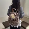2026 Nova Mochila Infantil de Gato Kt de Pelúcia com Estampa de Leopardo para Meninas Mochila Escolar Desenho Animado Quente de Inverno com Cordão