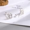 Pendientes de botón de flor elegantes estilo coreano celebridad de internet dulces de lujo ligero exquisitos incrustados de diamantes estilo frío pendientes de comercio exterior suministro al por mayor