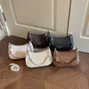 Bolso Nuevo de Verano Estilo Vintage Media Luna de Moda Patrón Tejido de Nicho Bolso de Hombro para Mujer 2026 Bolso Cruzado Único de un Solo Hombro