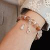 Pulsera de cristal natural de 10 mm al por mayor, con colgante de calabaza de circón hueco y fresa, estilo chino.