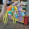 Novo Chaveiro de Garota Caçadora de Demônios Pingente de Personagem de Filme Decoração de Mochila de Estudante Caçador de Demônios Pequeno Presente