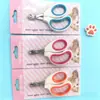 Cortauñas para gatos de corte biselado pequeño con agujero redondo, cortauñas anti-corte para mascotas, cortapelos para mascotas, tijeras para uñas de mascotas, en stock al por mayor
