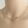 Collar de cadena de serpiente de metal con diseño de hueso de serpiente, accesorios de joyería transfronteriza europea y americana, cadena trenzada de cuentas redondas de doble capa, collar combinable.