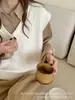 Colete de tricô com decote em V para mulheres, novo colete sem mangas de outono e inverno, versátil para sobreposição, top colete de suéter casual e simples