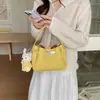 Bolso de hombro cruzado casual de diseño de nicho transfronterizo para mujer, nuevo bolso de cubo de mano de moda estilo coreano para el verano de 2026