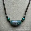 Colar de contas feito à mão com contas dzi de nove olhos do Tibete, corrente para clavícula com dente de tigre e pingente dzi com padrão de deus da fortuna