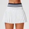 Falda plisada de línea A estilo preppy retro de verano Falda deportiva anti-exposición que cubre la cadera Forro de falda deportiva para tenis