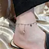Sin decoloración Estilo nuevo simple tobillera de acero de titanio para niña sensación de alta gama cuerda roja suerte verano moda lujo ligero corazón de amor adornos para el pie