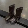 Botas vaqueras negras elegantes y sencillas de 1 cm, nuevo modelo otoño e invierno 2026, punta redonda, suela plana, botines cortos sin cordones para mujer