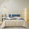 Juego de cuatro piezas de algodón de fibra larga de lujo de 60 hilos, funda de edredón bordada 100% algodón puro, juego de tres piezas estilo sábana ajustable, ropa de cama de color liso