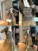 Camiseta de manga larga para mujer con rayas de contraste, corte entallado, diseño moderno y único, adecuada para primavera y otoño