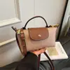 Bolso cruzado ligero de moda transfronterizo, bolso de mano con diseño de nicho, mini bolso cuadrado, bolso de mujer, venta al por mayor personalizada