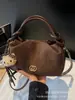 Bolsa Feminina 2025 Nova Moda Outono e Inverno High-End Retrô para o Dia a Dia Feminina Ombro Único Transversal Bolsa Bolinho