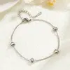 Tobillera de mini corazón única y moderna para mujer, de alta gama y versátil, hecha de acero de titanio y acero inoxidable, exquisita forma de corazón