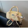 Bolsas Femininas de Alto Padrão Transfronteiriças, Versátil para a Primavera de 2026, Nova Bolsa Transversal da Moda, Bolsa de Mão Casual, Bolsa Boston Almofada