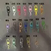 Hebilla de puerta giratoria colorida 303 broche de langosta anillo abierto lacado colgante de llavero accesorios DIY para bolsos y muñecas
