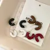 Pendientes de Metal Retro Francés de Gama Alta con Forma de C y Esmalte de Goteo Lujo Accesible Diseño de Nicho Pendientes Elegantes Pendientes Populares