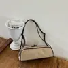Bolsa feminina de camurça 2026 novo outono vintage Maillard bolsa de ombro para o dia a dia bolsa de mão de nicho