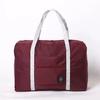 Tienda al por mayor suministro bolsa de mano portátil bolsa de almacenamiento de viaje bolsa de viaje plegable bolsa organizadora primera generación de almacenamiento